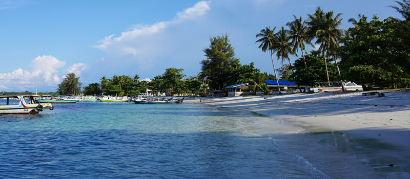 Peran Pantai Tanjung Kelayang dalam Pariwisata Belitung